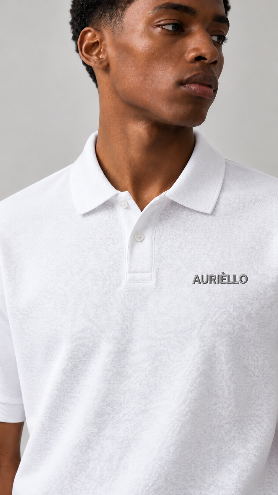 AURIÈLLO Golf T-Shirt in White — embroidered logo detail